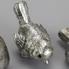 Kép 5/5 - Ezüst madárka kicsi fém 4cm - 1db