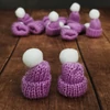 Kép 1/3 - Mini kötött sapka lila 12db/cs