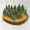 Kép 3/8 - Dekor fenyőfa zöld 6cm 20db/csomag