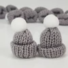 Mini kötött sapka szürke 12db/cs