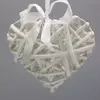 Kép 2/4 - Fehér vessző szív fém vázon 15cm