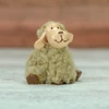 Kép 3/5 - Üldögélő bolyhos birka figura bézs